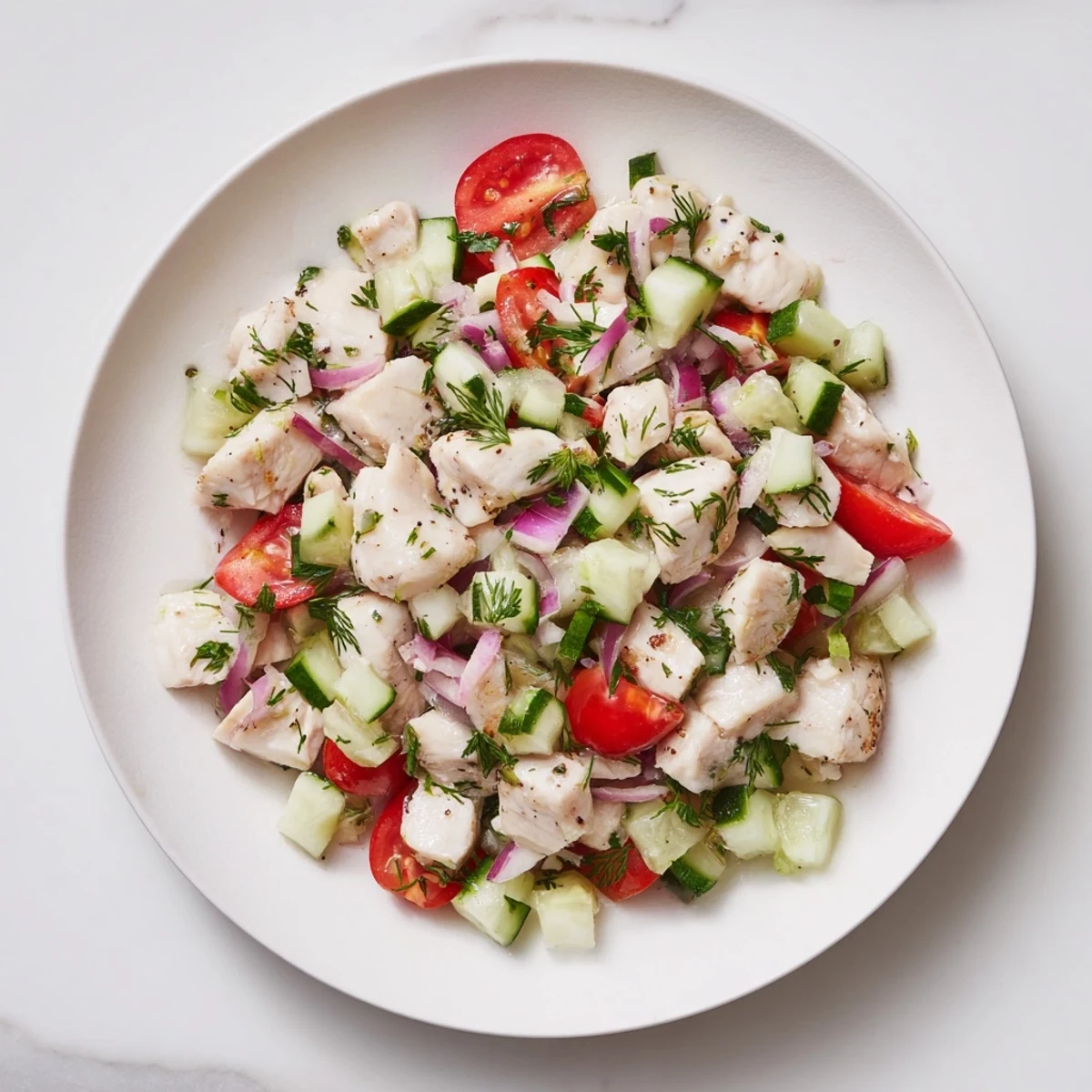 Bright, colorful Cucumber and Chicken Clean Shaker salad, a light and healthy meal ready to eat.