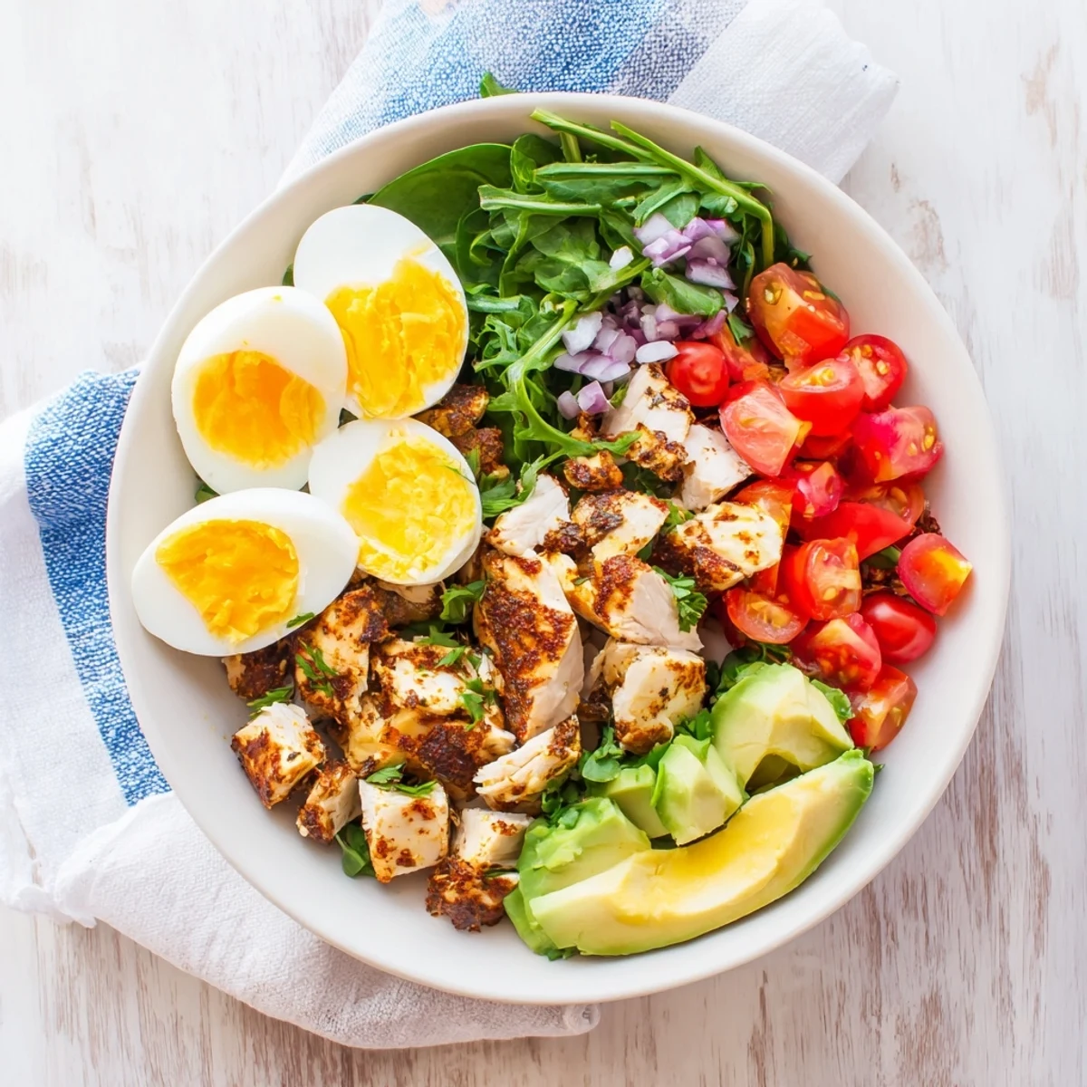 High-Protein Chicken and Egg Salad, a creamy mix of shredded chicken and chopped eggs, ready to enjoy.