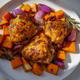 Honey-Glazed Chicken with Roasted Root Vegetables: Crispy skin, sweet glaze, and earthy vegetables.
