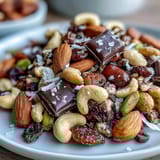 A vibrant mix of roasted nuts, chewy apricots, and rich dark chocolate chunks, ideal for energizing hikes or beach trips.