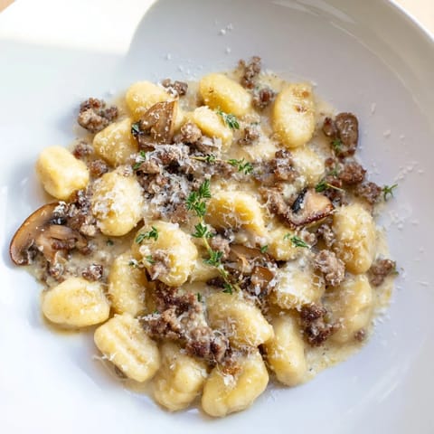 Golden, browned sausage and mushrooms mingle with tender gnocchi in this rustic Woodsy Skillet creation.