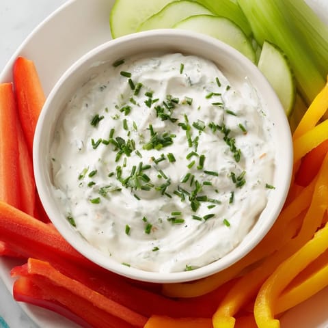 Creamy Kids Dip: Cream Cheese and Ranch Dip, with a side of fresh carrots, celery, and bell peppers.