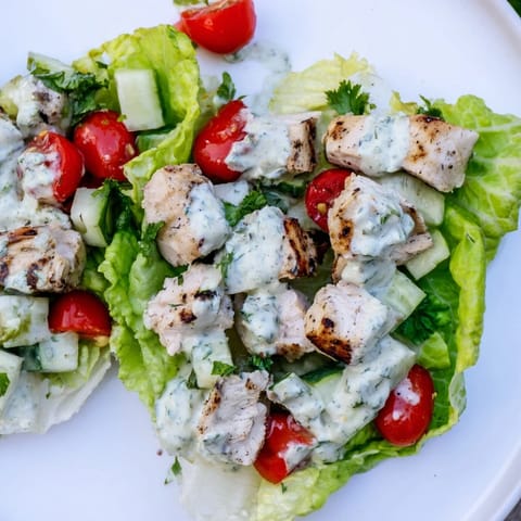 Freshly blended jalapeño ranch dressing drizzled over tender chicken, crunchy romaine, and vibrant veggies, garnished with cheddar and tortilla strips.